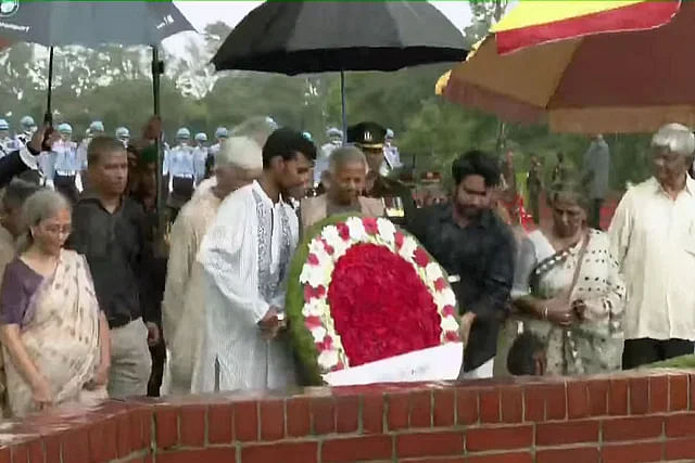 The 14 advisors of the interim government paid homage to martyrs of the liberation war at the National Memorial this morning amid rain